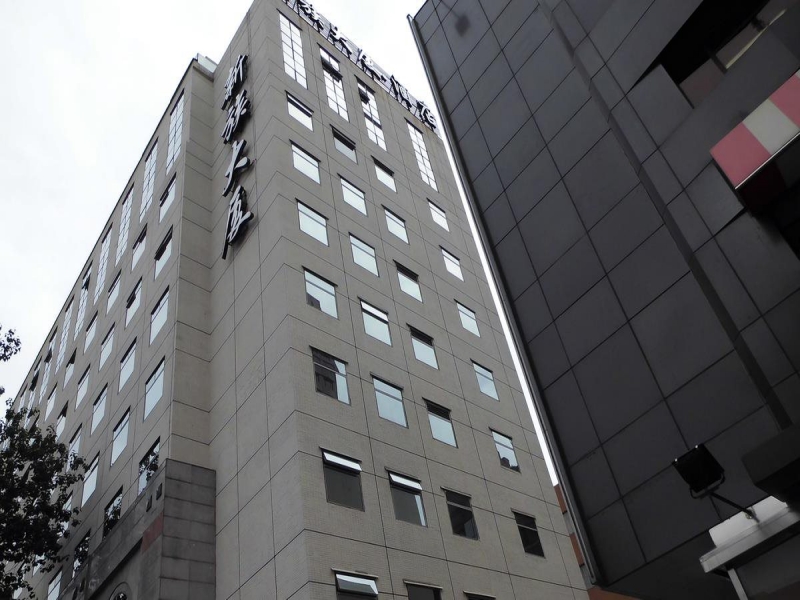 北京新族大厦幕墙维修翻新合作案例｜精捷建筑